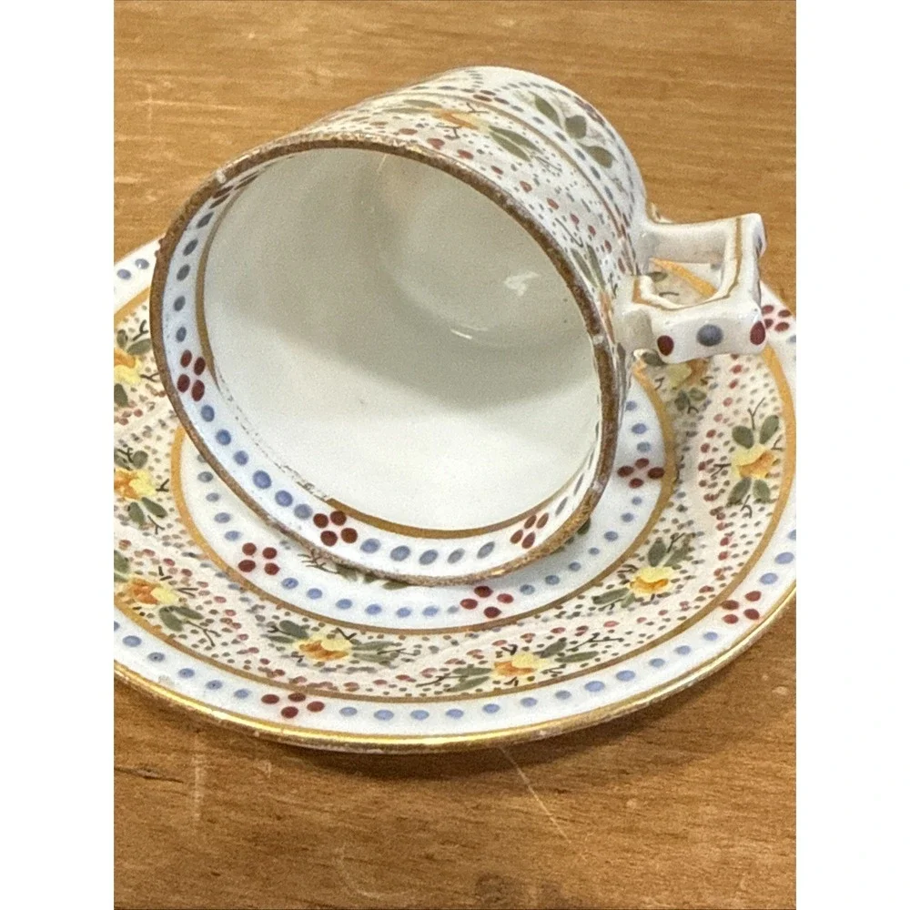 Antique Austrian demitasse cup and saucer hand painted floral gold trim